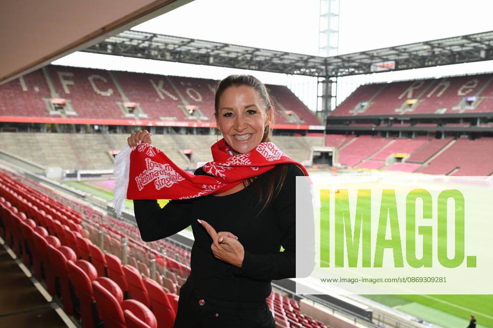 Singer and host Andrea Schönenborn poses at the press conference for the Loss mer Weihnachtsleeder singe (Let’s Sing Christmas Carols) sing-along concert, which will take place this year on December 22 and 23, 2026, at Cologne’s RheinEnergie Stadium and is expected to draw over 90,000 fans