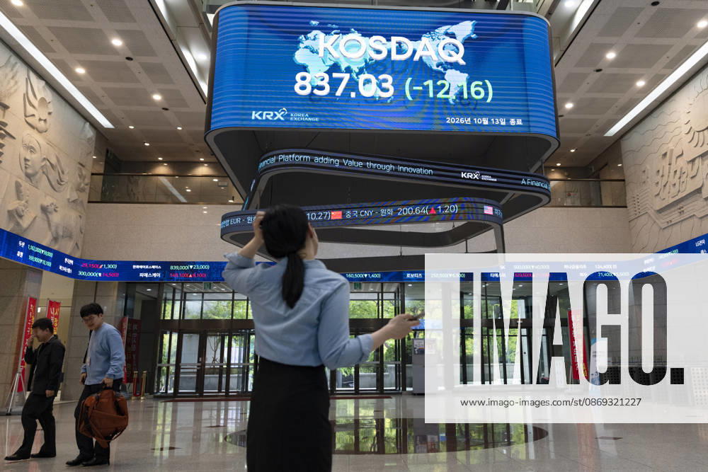 South Korea Stocks Plunge As KOSPI Drops Sharply At KRX In Seoul A Korea Exchange (KRX) employee looks up at the electronic board displaying the closing KOSDAQ index at 837.03 (-12.16) in Yeouido, Seoul, South Korea, on October 13, 2026. Seoul Seoul South Korea