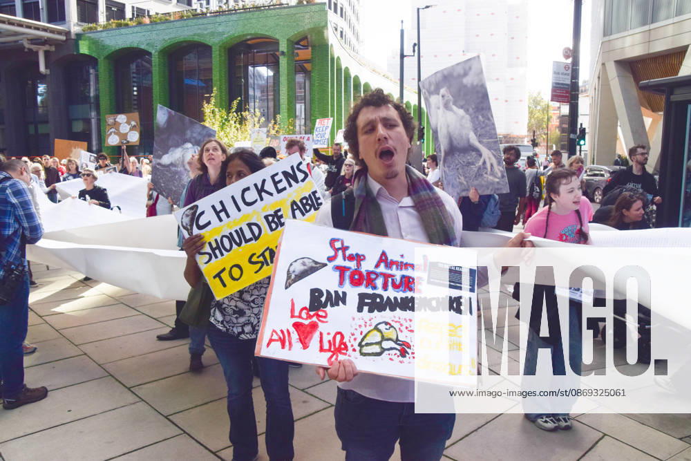 Protesters gather outside Pret headquarters urging the fast food chain to drop Frankenchickens. Frankenchickens are chickens mostly raised on factory farms who are bred to grow much faster and who are said to suffer far more than regular chickens. London United Kingdom - ZUMAv130 20261013_zip_v130_041