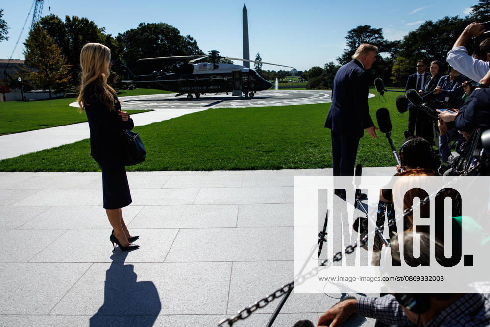 DC: President Trump Departs the White House White House Press Secretary Katie Zacharia listens as President Donald Trump speaks to members of the media before departing from the South Lawn of the White House in Marine One on October 13, 2026 in Washington, D.C. Trump is heading to Wasilla, Alaska for a midterm campaign rally in support of Senator Dan Sullivan and Representative Nick Begich before heading to Las Vegas, Nevada where he will spend the night. (Photo by Samuel Corum Pool ABACAPRESS.COM) Washington DC United States