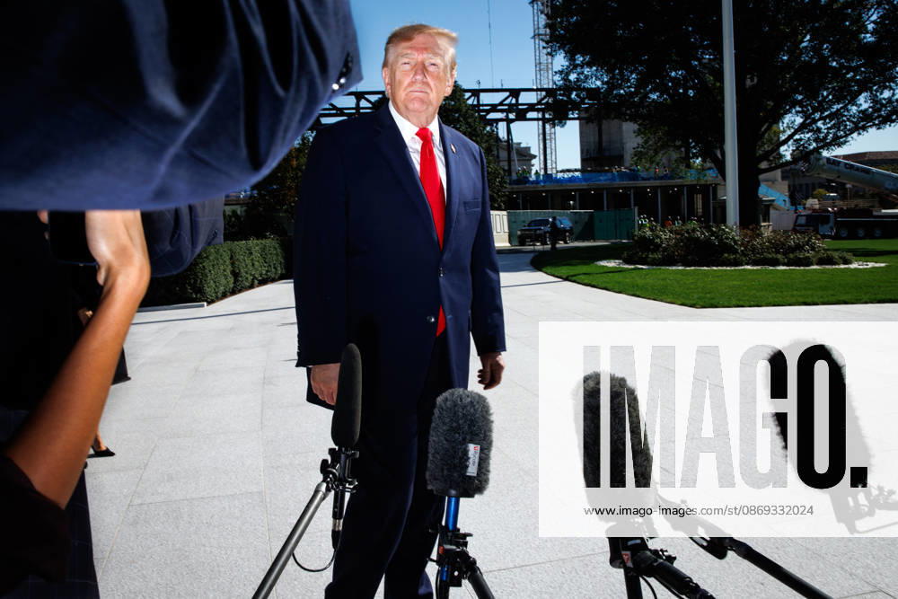 DC: President Trump Departs the White House President Donald Trump speaks to members of the media before departing from the South Lawn of the White House in Marine One on October 13, 2026 in Washington, D.C. Trump is heading to Wasilla, Alaska for a midterm campaign rally in support of Senator Dan Sullivan and Representative Nick Begich before heading to Las Vegas, Nevada where he will spend the night. (Photo by Samuel Corum Pool ABACAPRESS.COM) Washington DC United States
