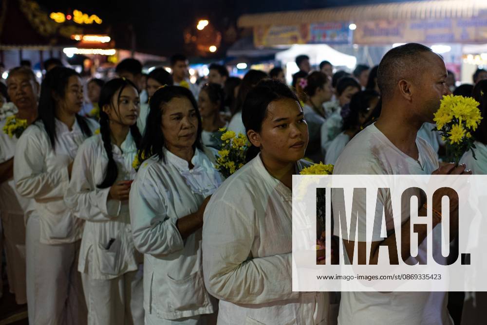 Devotees pray at the Chinese shrine during the Vegetarian Festival..The annual Vegetarian Festival is held in Bangkok and many parts of southern Thailand, including Trang, Phatthalung, and Phuket, where worshippers refrain from eating animal products over the nine days, coinciding with the celebration of the Nine Emperor Gods. Trang Thailand - ZUMAs197 20261013_aaa_s197_184