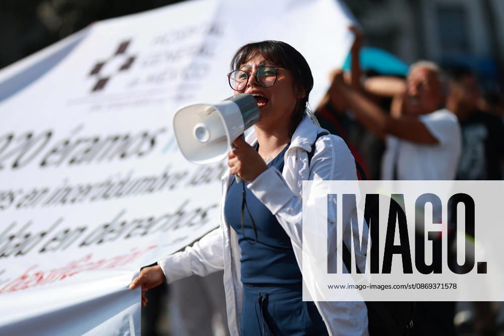 Thousands of healthcare workers hold national protest in Mexico City MEXICO CITY, MEXICO - OCTOBER 13: A woman takes part in a national protest march demanding wage increases for healthcare workers and more medical supplies for Mexico s public health system, in Mexico City, Mexico on October 13, 2026. Thousands of members of the Mexican Social Security Institute (IMSS) marched to demand higher wages, improved working conditions, and action to address nationwide shortages of basic medicines and supplies across public hospitals. Daniel Cardenas Anadolu Mexico City Mexico. Editorial use only. Please get in touch for any other usage.