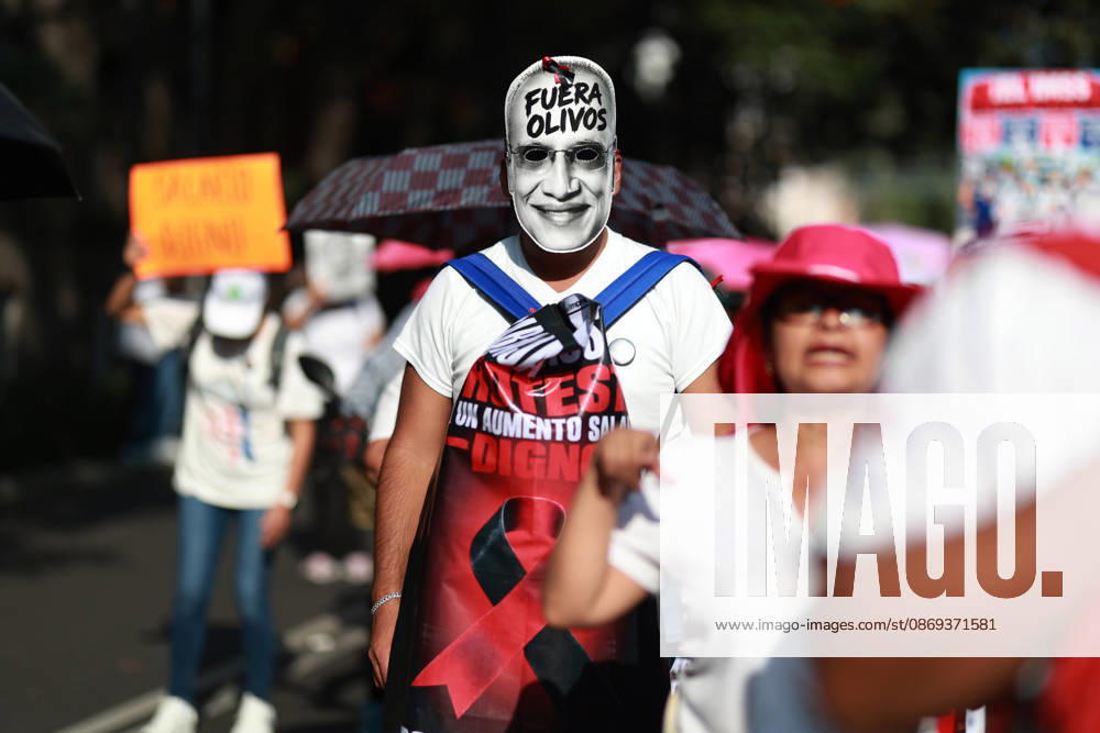 Thousands of healthcare workers hold national protest in Mexico City MEXICO CITY, MEXICO - OCTOBER 13: People take part in a national protest march demanding wage increases for healthcare workers and more medical supplies for Mexico s public health system, in Mexico City, Mexico on October 13, 2026. Thousands of members of the Mexican Social Security Institute (IMSS) marched to demand higher wages, improved working conditions, and action to address nationwide shortages of basic medicines and supplies across public hospitals. Daniel Cardenas Anadolu Mexico City Mexico. Editorial use only. Please get in touch for any other usage.
