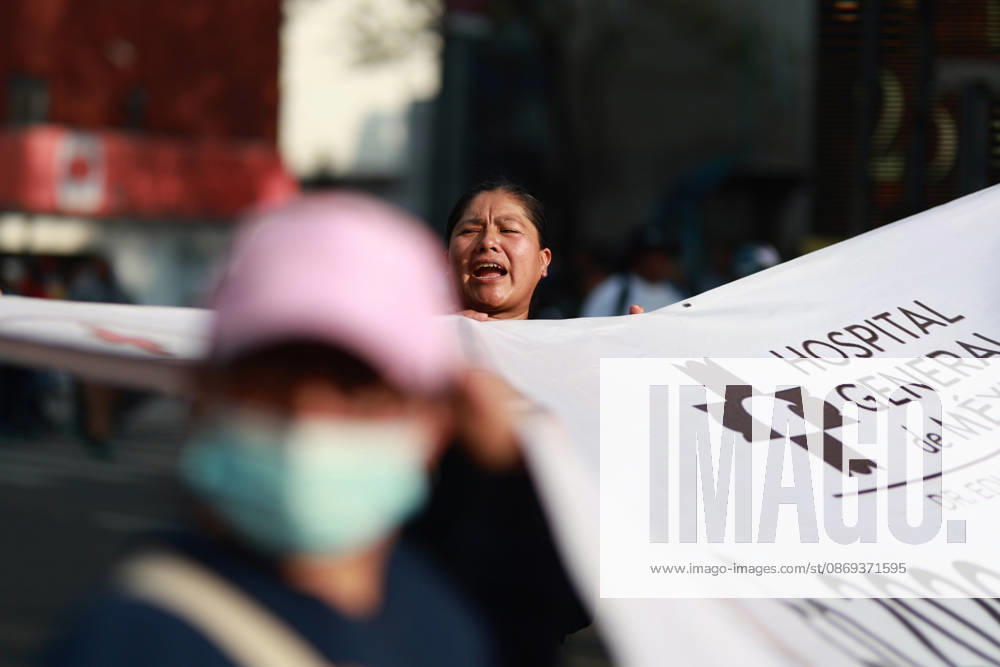 Thousands of healthcare workers hold national protest in Mexico City MEXICO CITY, MEXICO - OCTOBER 13: A woman takes part in a national protest march demanding wage increases for healthcare workers and more medical supplies for Mexico s public health system, in Mexico City, Mexico on October 13, 2026. Thousands of members of the Mexican Social Security Institute (IMSS) marched to demand higher wages, improved working conditions, and action to address nationwide shortages of basic medicines and supplies across public hospitals. Daniel Cardenas Anadolu Mexico City Mexico. Editorial use only. Please get in touch for any other usage.