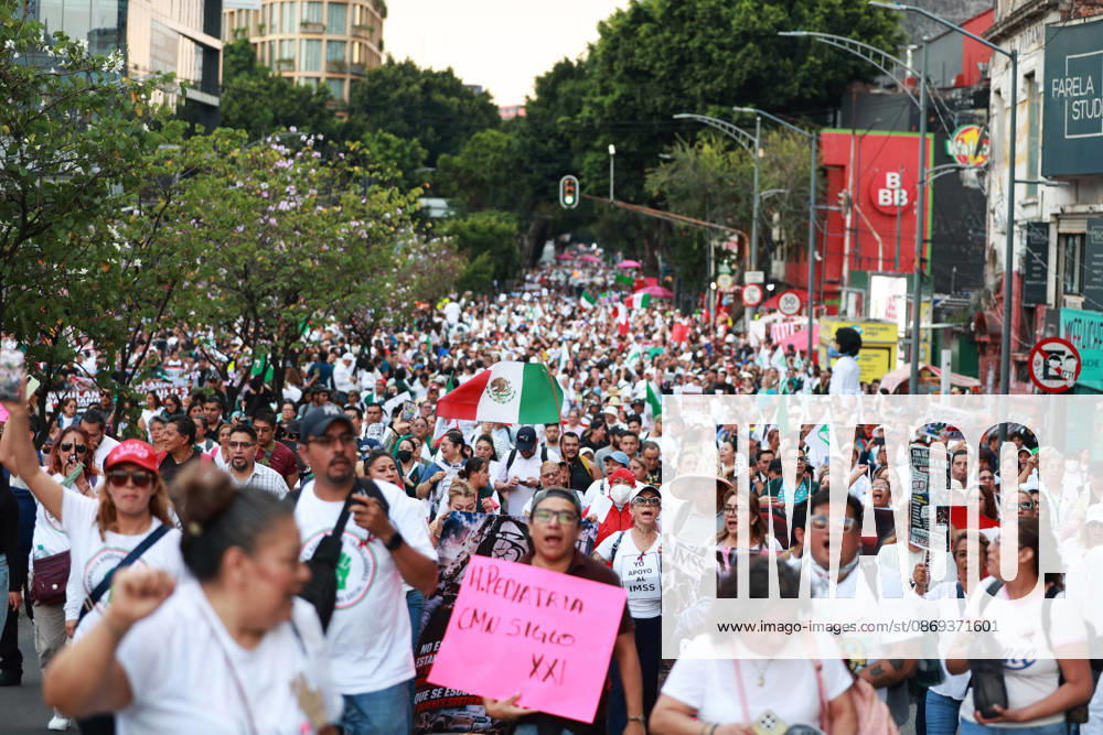 Thousands of healthcare workers hold national protest in Mexico City MEXICO CITY, MEXICO - OCTOBER 13: People take part in a national protest march demanding wage increases for healthcare workers and more medical supplies for Mexico s public health system, in Mexico City, Mexico on October 13, 2026. Thousands of members of the Mexican Social Security Institute (IMSS) marched to demand higher wages, improved working conditions, and action to address nationwide shortages of basic medicines and supplies across public hospitals. Daniel Cardenas Anadolu Mexico City Mexico. Editorial use only. Please get in touch for any other usage.