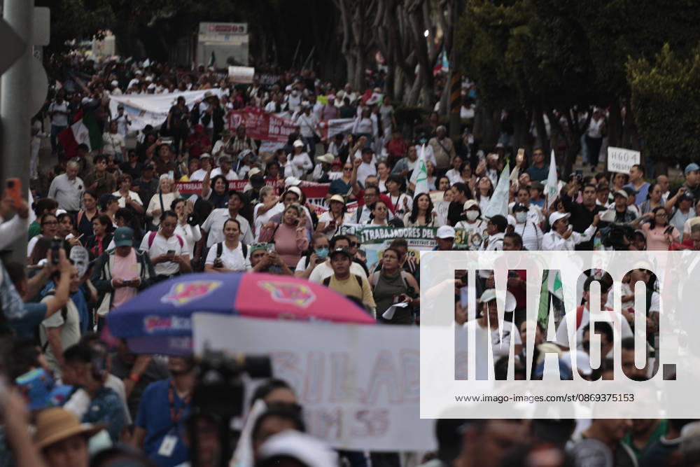 Thousands of medical and healthcare workers from the Mexican Social Security Institute (IMSS) are staging a massive nationwide protest. In Mexico City, demonstrations are taking place at headquarters and hospitals, with the main march heading toward the union s offices; the march began at the government-run Siglo XXI HospitalÃ¢â‚¬which relies on federal funding and serves employees from various Mexican government agencies. The protest stems from workers demands for better working conditions, specifically addressing excessive workloads, unfilled vacancies across all departments, and the need for proper maintenance of clinical and hospital facilities as well as workplace safety standards. Other - ZUMAp204 20261013_zip_p204_057