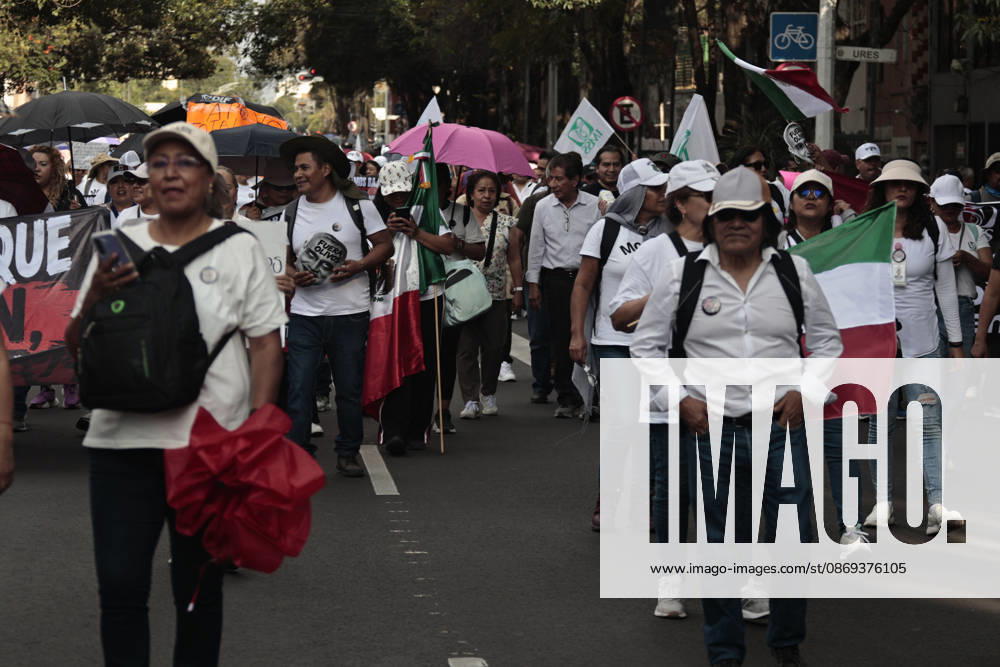 Thousands of medical and healthcare workers from the Mexican Social Security Institute (IMSS) are staging a massive nationwide protest. In Mexico City, demonstrations are taking place at headquarters and hospitals, with the main march heading toward the union s offices; the march began at the government-run Siglo XXI Hospital which relies on federal funding and serves employees from various Mexican government agencies. The protest stems from workers demands for better working conditions, specifically addressing excessive workloads, unfilled vacancies across all departments, and the need for proper maintenance of clinical and hospital facilities as well as workplace safety standards. Other dema - ZUMAp204 20261013_zip_p204_053