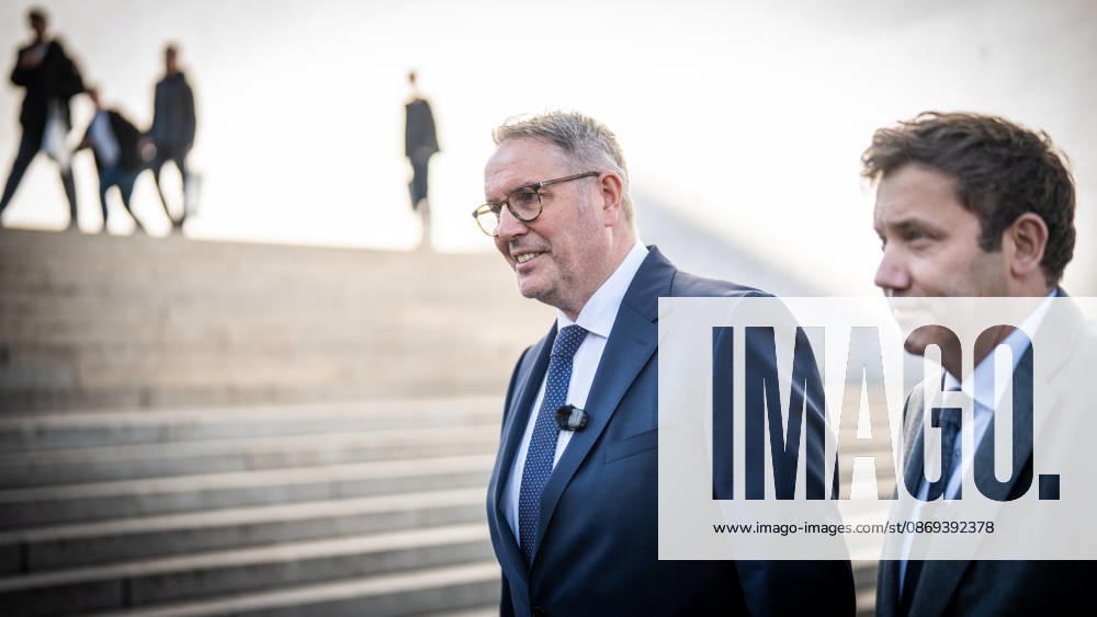Lars Klingbeil, SPD Party Chairman and Federal Minister of Finance, and Alexander Schweitzer, Federal Minister of Labor-designate, at Friedrich-Ebert-Platz in front of the Bundestag building; introduction of the new Federal Minister of Labor on the day of his swearing-in by the SPD Party Chairman, Berlin, Berlin, Germany, Friedrich-Ebert-Platz