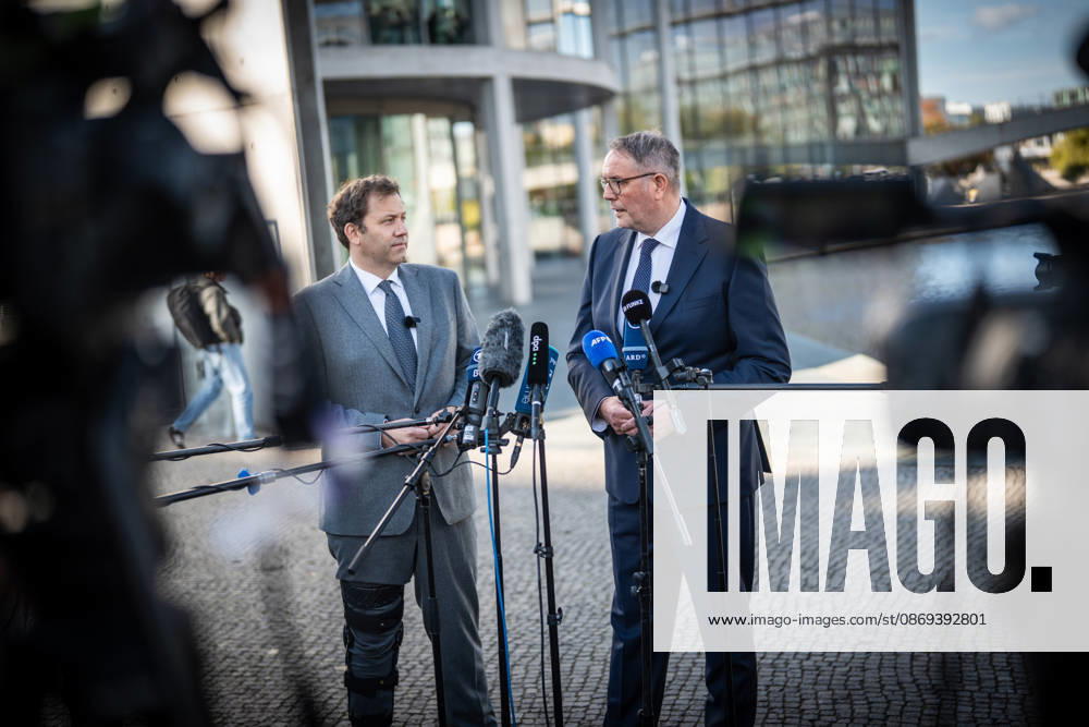 Lars Klingbeil, SPD Party Chairman and Federal Minister of Finance, and Alexander Schweitzer, Federal Minister of Labor-designate, at Friedrich-Ebert-Platz in front of the Bundestag building; introduction of the new Federal Minister of Labor on the day of his swearing-in by the SPD Party Chairman, Berlin, Germany, Friedrich-Ebert-Platz