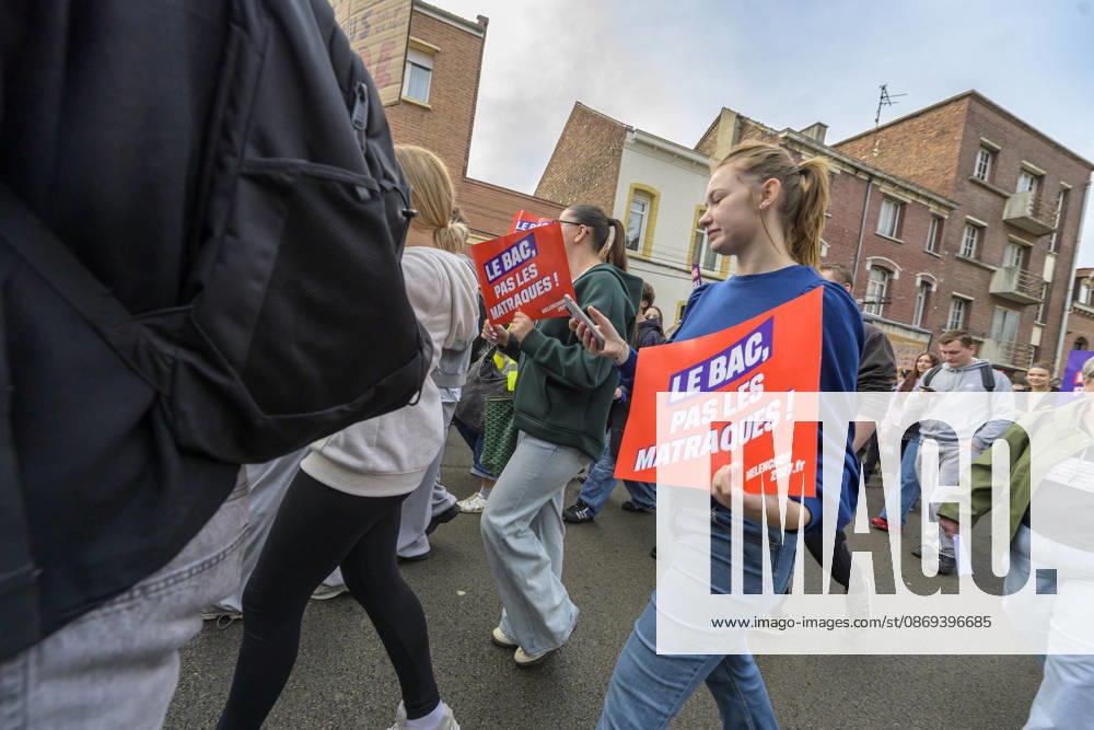High School Students Demonstrate With Marine Tondelier In Lens - France High school students from Lens participate in a protest march through the streets of Lens, Pas de Calais, France on October 13, 2026, accompanied by political figures, teachers, and union representatives. Slogans displayed include Le Bac, pas les matraques (Baccalaureate, not batons). Photo by Blanquart C ANDBZ ABACAPRESS.COM Lens Hauts-de-France France