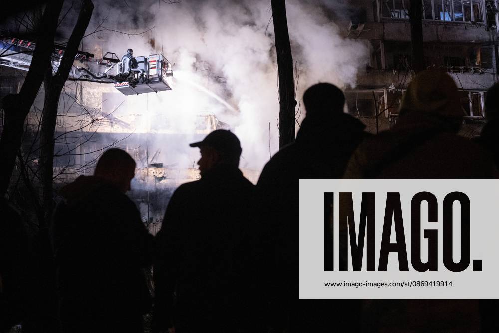 A rescuer on an aerial platform extinguishes a fire that broke out following a Russian missile strike on a nine-story residential building in Kyiv’s Desnianskyi district, Ukraine, on October 14, 2026. Russia launched a massive ballistic missile attack on the capital. Three women were killed and 19 other people were injured in the Desnianskyi district, including a seven-year-old girl. Apartments in the nine-story building were also damaged from the first through the eighth floor (Photo by Danylo Antoniuk Ukrinform) Ballistic missile strikes next to nine-story residential building in Desnianskyi district of Kyiv