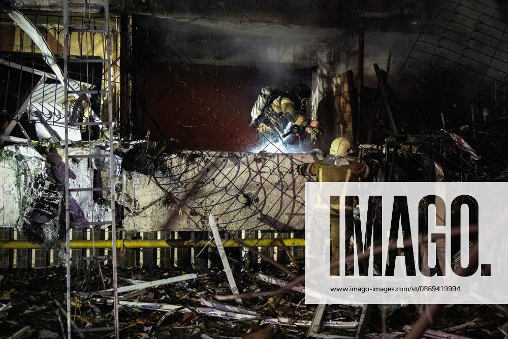 Rescuers work at the scene of a Russian missile strike on a nine-story residential building in Kyiv’s Desnianskyi district, Ukraine, on October 14, 2026. Russia launched a massive ballistic missile attack on the capital. Three women were killed and 19 people were injured in the Desnianskyi district, including a seven-year-old girl. Apartments on the first through eighth floors of the building were also damaged (Photo by Danylo Antoniuk Ukrinform) Ballistic missile strikes next to nine-story residential building in Desnianskyi district of Kyiv