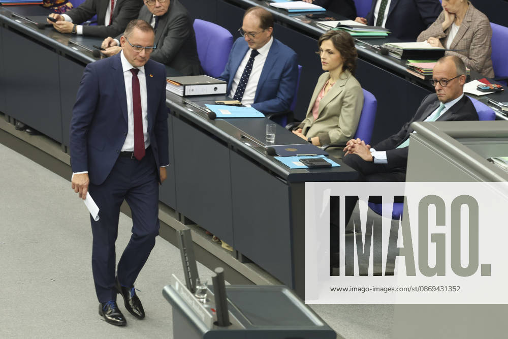 Tino Chrupalla and Friedrich Merz at the session of the German Bundestag on October 14, 2026, in Berlin; Chancellor Merz delivering the government’s policy statement to the German Bundestag