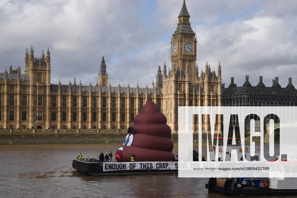 Campaigners inflate a giant ˜poo on the River Thames outside the Parliament, calling on the UK government to act on sewage pollution. London United Kingdom - ZUMAv130 20261014_zip_v130_005