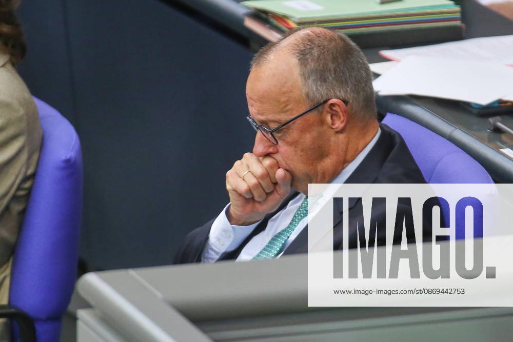 German Bundestag 101st Session of the Bundestag Chancellor Friedrich Merz (CDU) is coughing