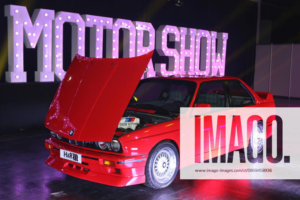 BMW M3 Evolution II Special Edition, limited to 500 units, 3 Series E30, model year 1988, Misanorot color, with the hood open, revealing the BMW M Power lettering from exhibitor H R Spezialfedern, Media event Carwalk for the Essen Motor Show on October 14, 2026, at Messe Essen in the run-up to the Essen Motor Show 2026 (November 28, 2026 – December 6, 2026), EM
