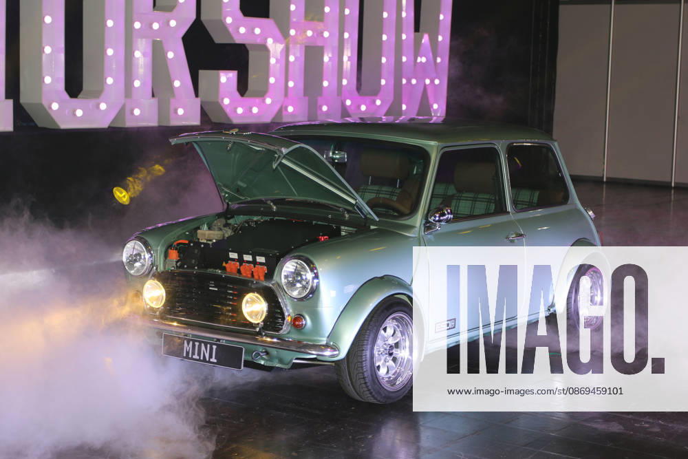 Rover Mini WATTson electric car with a Tesla motor, based on a 1996 Rover Mini Cooper 1 3i, in artificial fog with the hood open, Media event Carwalk for the Essen Motor Show on October 14, 2026, at Messe Essen in the run-up to the Essen Motor Show 2026 (November 28, 2026 – December 6, 2026), EMS Preview on November 27, 2026, special exhibition tuningXperience