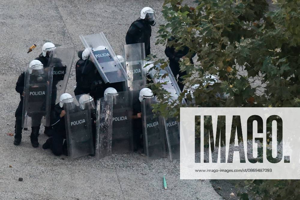 Tirana Protests Escalate Into Clashes TIRANA, ALBANIA, OCTOBER 14, 2026: Demonstrators clash with riot police during student-led protests over rising education costs, university conditions and alleged corruption in Tirana. Fires damage the Ministry of Education and bank premises as protesters throw stones and other objects, while police use tear gas and water cannons. Tirana Albania