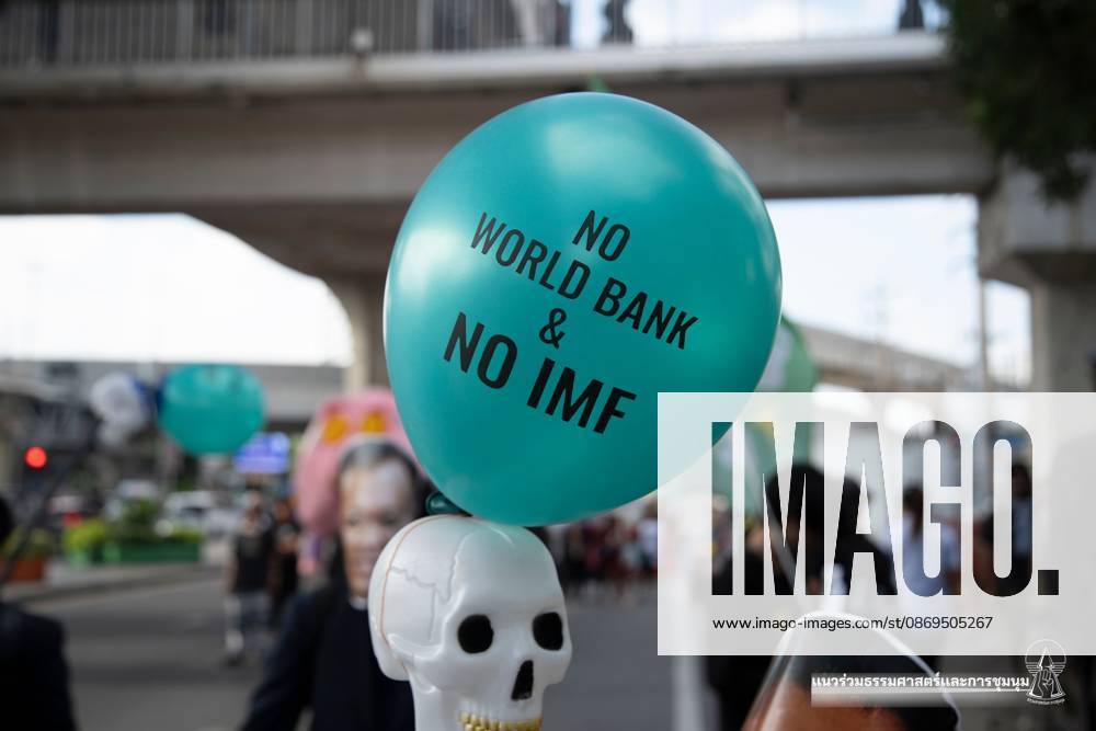 BANGKOK, THAILAND, OCTOBER 15, 2026: Civil society activists march in Bangkok to protest against the World Bank and the International Monetary Fund during their 2026 Annual Meetings. Demonstrators carry banners and signs opposing the institutions as organisers seek police permission to demonstrate outside the Queen Sirikit National Convention Center. Bangkok Thailand - ZUMAq101 20261015_zna_q101_040