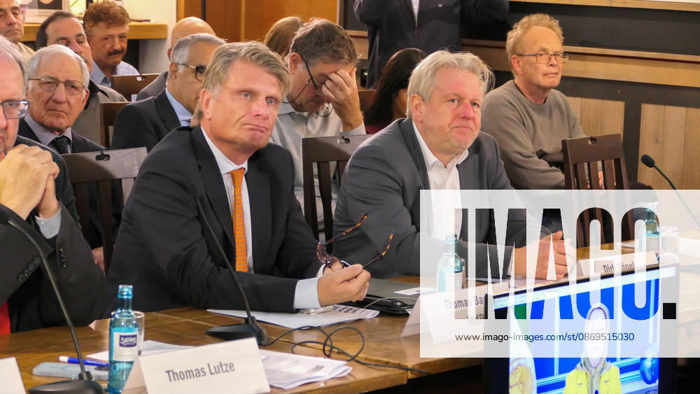 German Bundestag Members ,Thomas Bareiß and Dirk Vöpel seen during the conference at the panel table as a video message of Mrs. Maryam Rajavi, the president elect of NCRI is displayed on a monitor . The conference, titled Iran in Crisis: The Democratic Solution and Germany s Responsibility, was organized by the German Solidarity Committee for a Free Iran (DSFI) and the Association of German-Iranians (GDI) at Hopfingerbräu am Brandenburger Tor in Berlin, Germany, on October 14, 2026. The conference brought together German federal lawmakers, former diplomats, and witnesses to discuss human rights, democratic prospects for Iran, and an open letter signed by 80 German dignitaries protesting the Friedrich N - ZUMAs197 20261014_aaa_s197_463