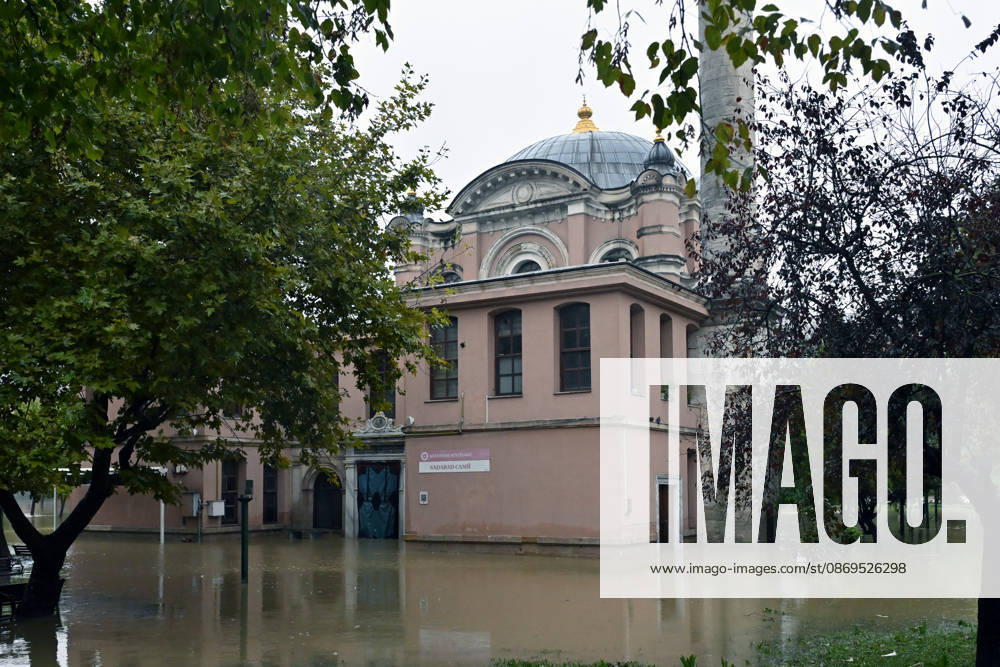 Historic Sadabat Mosque and surrounding structures submerged as Kagithane Stream overflows in Istanbul ISTANBUL, TURKIYE - OCTOBER 15: Floodwaters surround the historic Sadabat Camii (Aziziye Mosque) and surrounding structures in the Kagithane district of Istanbul, Turkiye on October 15, 2026. Heavy downpours caused the Kagithane Stream to overflow its banks, inundating nearby historical sites, courtyards, and streets. Isa Terli Anadolu Istanbul Turkey. Editorial use only. Please get in touch for any other usage.