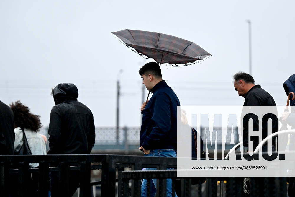 Heavy rainfall in Istanbul ISTANBUL, TURKIYE - OCTOBER 15: People stroll the city with raincoats and umbrellas in Eminonu district during heavy rainfall in Istanbul, Turkiye, on October 15, 2026. Arif Hudaverdi Yaman Anadolu Istanbul Turkey. Editorial use only. Please get in touch for any other usage.