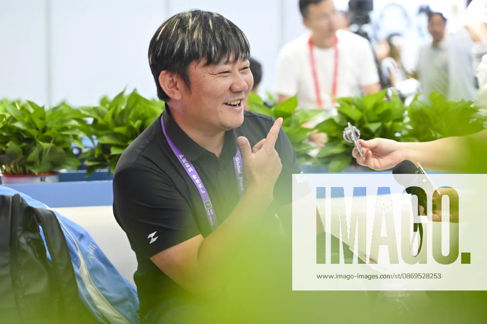 Zhang Xue speaks to media at the booth of Chinese motorcycle brand Zhangxue Motorcycle (ZXMOTO) during the 140th China Import and Export Fair (Canton Fair) on October 15, 2026 in Guangzhou, Guangdong Province of China. The fair runs in three phases until November 4, covering a total exhibition area of 1.55 million square meters.