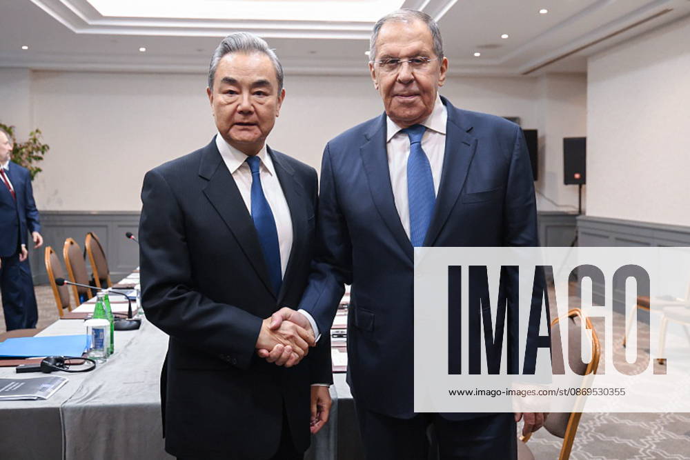 AZERBAIJAN, BAKU - OCTOBER 15, 2026: Russia s Foreign Minister Sergei Lavrov and his counterpart Wang Yi of China shake hands during a meeting held as part of the Conference on Interaction and Confidence-Building Measures in Asia (CICA) summit. Video screen grab. Best quality available Baku Azerbaijan - ZUMAt113 20261015_zaa_t113_030