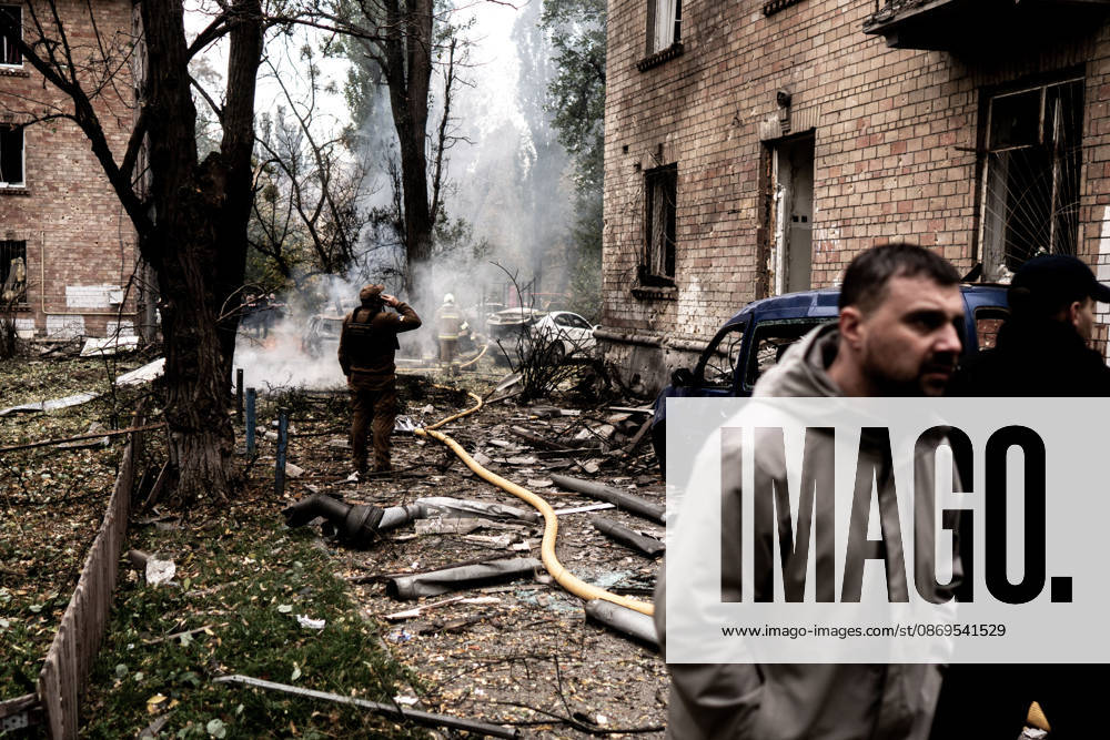 Aftermath of Russian drone attack in Kyiv KYIV, UKRAINE - OCTOBER 15: Firefighters operate following a Russian drone strikes a residential area in the city center, injuring a man who was near the impact site, in Kyiv, Ukraine, on October 15, 2026. Vincenzo Circosta Anadolu Kyiv Ukraine. Editorial use only. Please get in touch for any other usage.