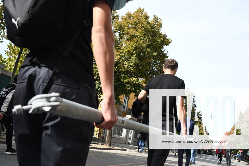 Student protests demanding improved educational conditions continue in Albania TIRANA, ALBANIA - OCTOBER 15: A protester carries a metal pole as demonstrators march through the streets during the third day of protests demanding improved educational conditions in Tirana, Albania, on October 15, 2026. University students are joined by high school students and local residents as tensions escalate, with police using tear gas to disperse demonstrators outside the Ministry of Education and the Parliament building, while protesters throw stones and other objects at police officers. Olsi Shehu Anadolu Tirana Albania. Editorial use only. Please get in touch for any other usage.