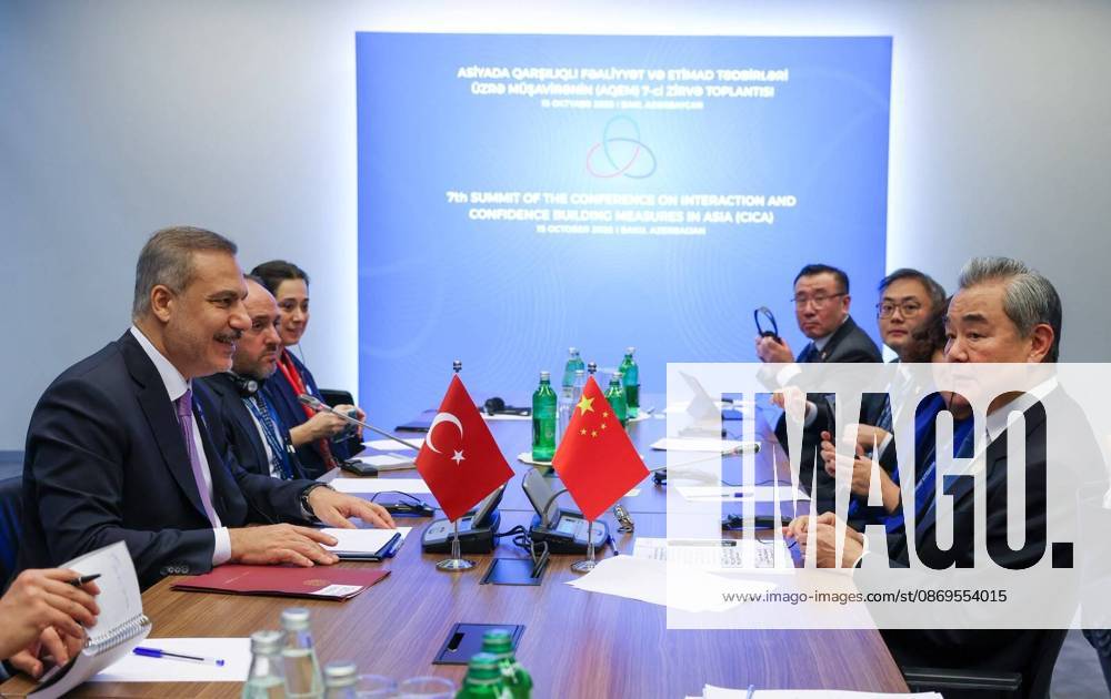 Turkish Foreign Minister Hakan Fidan addresses CICA summit in Baku BAKU, AZERBAIJAN - OCTOBER 15: (---- - MANDATORY CREDIT - ‘TURKISH MINISTRY OF FOREIGN AFFAIRS HANDOUT - NO MARKETING NO ADVERTISING CAMPAIGNS - DISTRIBUTED AS A SERVICE TO CLIENTS----) Turkish Foreign Minister Hakan Fidan (L) meets with Chinese Foreign Minister Wang Yi (R) on the sidelines of the 7th CICA Summit in Baku, Azerbaijan, on October 15, 2026. Turkish Foreign Ministry Handout Anadolu Baku Azerbaijan. Editorial use only. Please get in touch for any other usage.