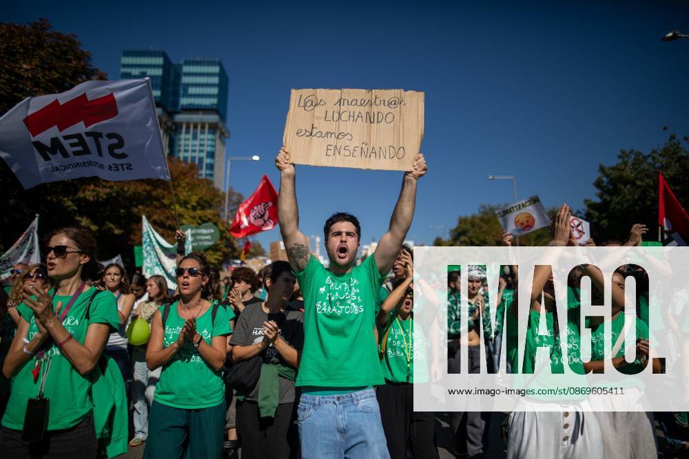 Protesters hold up signs during a demonstration for education in Madrid..Gathering of teachers on the second day of an indefinite strike, calling for improvements to public education in the Community of Madrid. Madrid Spain - ZUMAs197 20261015_aaa_s197_204