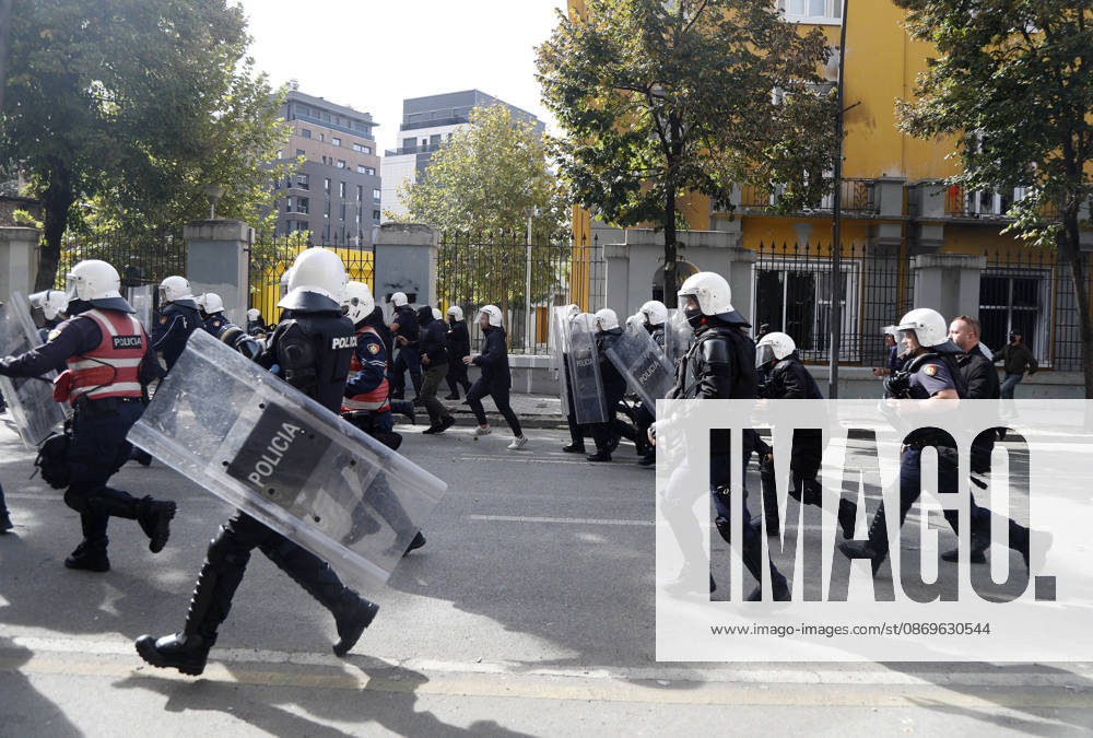 Protesters Clash with Police During a Demonstration in Tirana, Albania. Riot police officers clash with protesters during an anti-government demonstration in central Tirana on October 15, 2026, as protests continued for a third consecutive day over university conditions and demands for the resignation of Albanian Prime Minister Edi Rama. The latest rally follows two nights of violence in the capital, during which protesters and riot police clashed, police used water cannons and tear gas, and demonstrators damaged government offices and shops and set fire to several buildings. Light Studio Agency Malton Dibra Tirana Albania