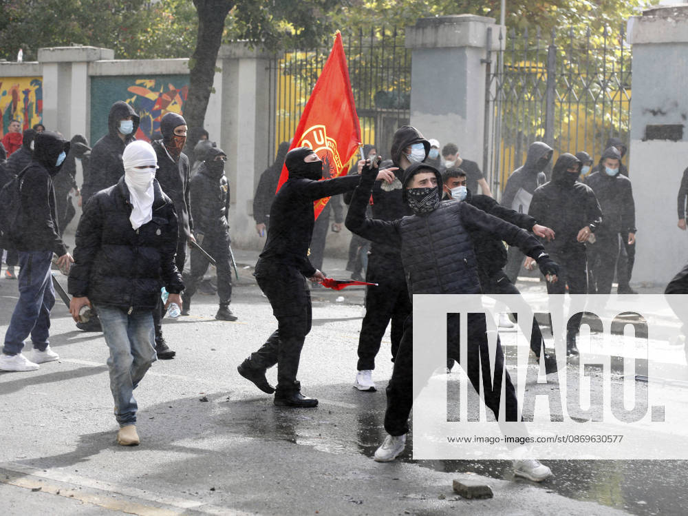 Protesters Clash with Police During a Demonstration in Tirana, Albania. Protesters throw stones at riot police during an anti-government demonstration in central Tirana on October 15, 2026, as protests continued for a third consecutive day over university conditions and demands for the resignation of Albanian Prime Minister Edi Rama. The latest rally follows two nights of violence in the capital, during which protesters and riot police clashed, police used water cannons and tear gas, and demonstrators damaged government offices and shops and set fire to several buildings. Light Studio Agency Malton Dibra Tirana Albania