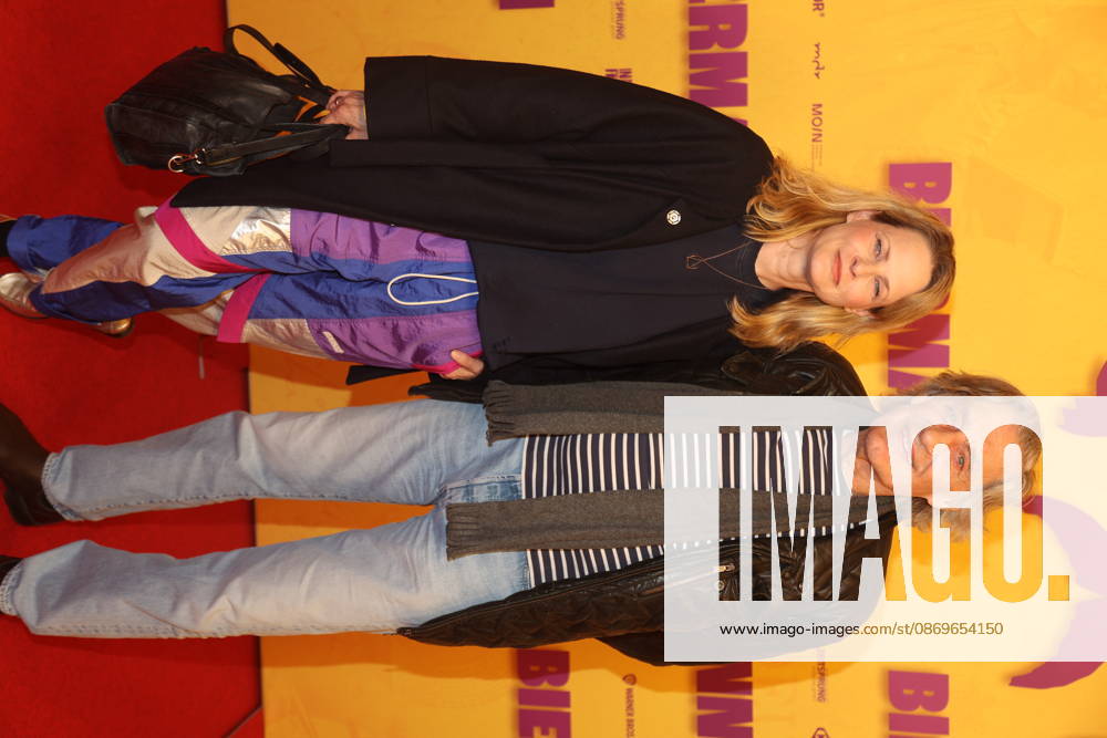 Antje Riis and Winfried Glatzeder at the premiere of the documentary *Biermann* at Kino International in Berlin