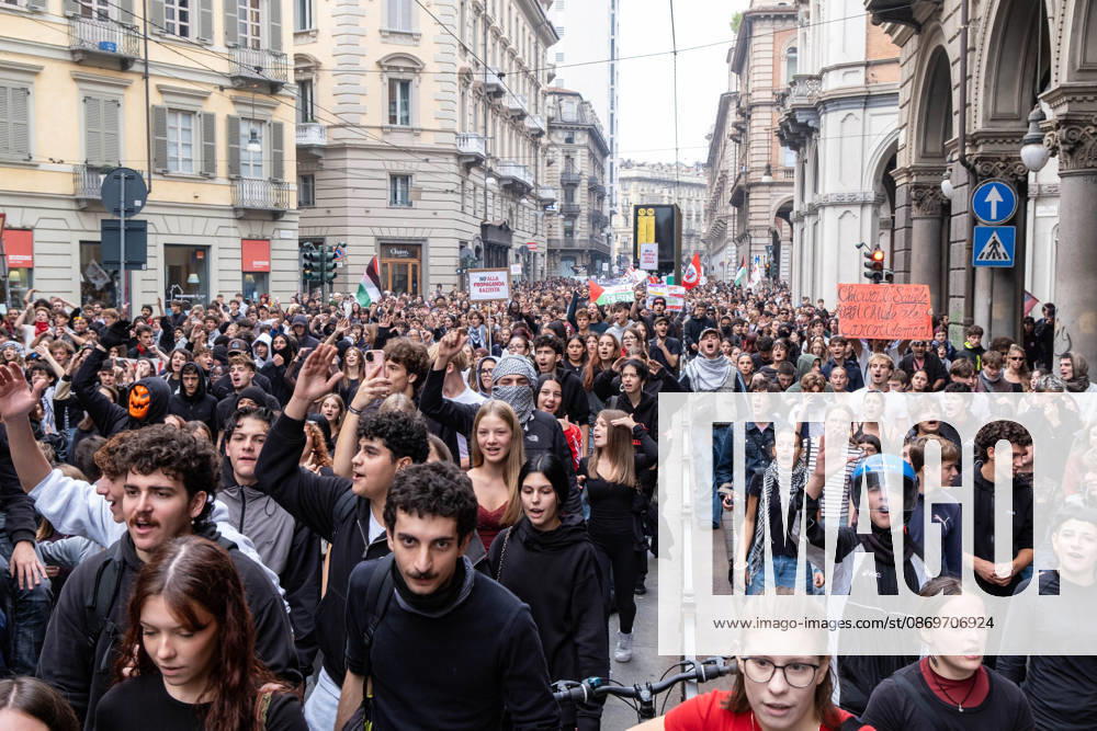 After days of occupations at many high schools across the city, following the French model, on Friday, October 16, in Turin, thousands of students took to the streets to protest the lack of resources in the school system and the inadequate condition of school buildings. The protesters marched through the city, stopping in front of Porta Susa, where teachers formed a human chain to separate them from the police. Lastly, in Piazza Castello, the police used water cannons and tear gas to disperse the demonstration, which had arrived outside the police headquarters. Turin Italy - ZUMAs377 20261016_znp_s377_033