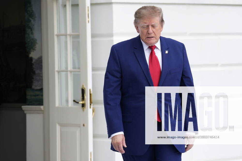 United States President Donald J Trump talks to the members of the media on the South Lawn of the White House in Washington, DC, USA, as he departs en route to Dalton, Georgia for a campaign rally on Friday