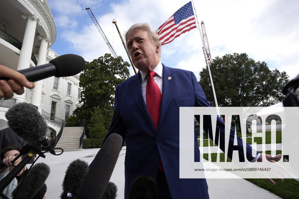 United States President Donald J Trump talks to the members of the media on the South Lawn of the White House in Washington, DC, USA, as he departs en route to Dalton, Georgia for a campaign rally on Friday