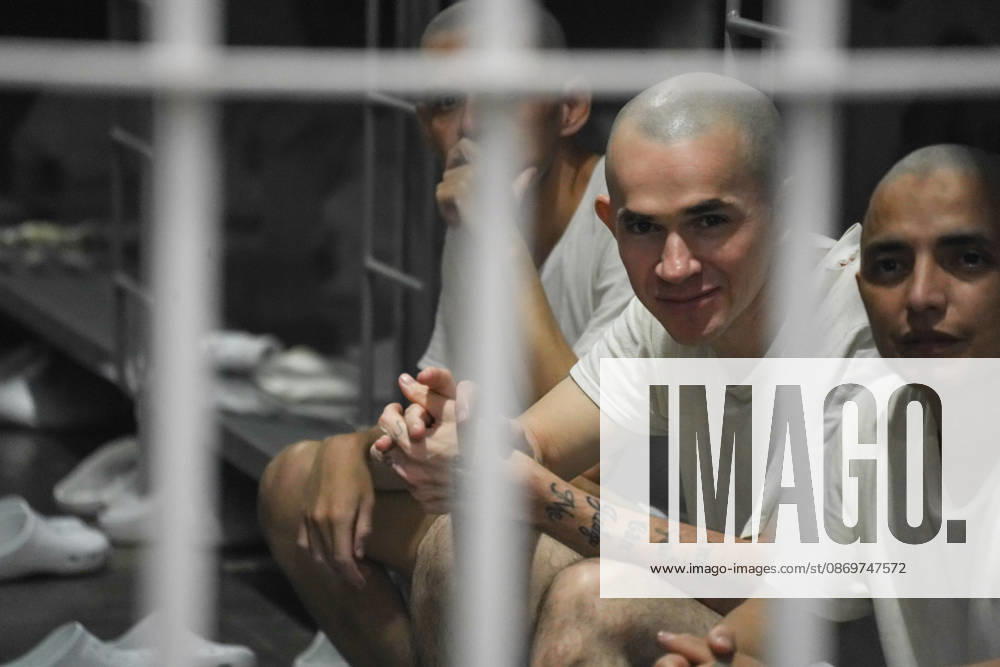 Gang members are seen through their cells during Costa Rican President Laura Fernandez s tour of the Terrorism Confinement Center (CECOT), in Tecoluca. Fernandez is on a three-day official visit to El Salvador to see the maximum-security prison that President Nayib Bukele’s government built as part of its crackdown on gangs. Costa Rica recently opened its own high-security prison, the High Containment Center Against Organized Crime, which is modeled on CECOT. Tecoluca El Salvador - ZUMAs197 20261016_aaa_s197_484