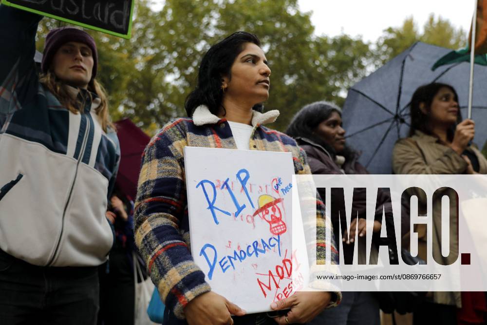 BERLIN, GERMANY - OCTOBER 17, 2026: A small group of demonstrators hold placards at Oranienplatz in the Kreuzberg district to show solidarity with mass protests in India and to protest against the crackdown on them, as several people take the floor to discuss the situation. The demonstration followed a call by Neha Bora, president of the All India Studentsâ€⠢ Association (AISA), for people everywhere to back the protests, saying â€oeeverywhere is Jantar Mantarâ€Â, the site in Delhi where the main protests are taking place. The protests demand the resignation of Chief Election Commissioner Gyanesh Kumar over a revision of electoral rolls that opponents say led to the mass deletion of voters, whi - ZUMAq101 20261017_zna_q101_064