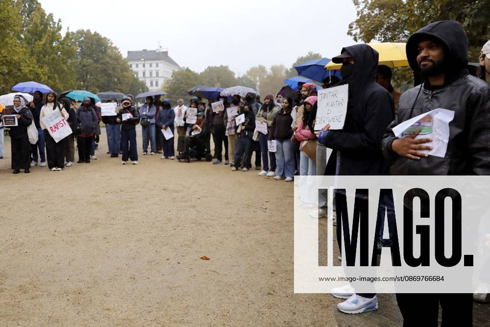 BERLIN, GERMANY - OCTOBER 17, 2026: A small group of demonstrators hold placards at Oranienplatz in the Kreuzberg district to show solidarity with mass protests in India and to protest against the crackdown on them, as several people take the floor to discuss the situation. The demonstration followed a call by Neha Bora, president of the All India Studentsâ€⠢ Association (AISA), for people everywhere to back the protests, saying â€oeeverywhere is Jantar Mantarâ€Â, the site in Delhi where the main protests are taking place. The protests demand the resignation of Chief Election Commissioner Gyanesh Kumar over a revision of electoral rolls that opponents say led to the mass deletion of voters, whi - ZUMAq101 20261017_zna_q101_072