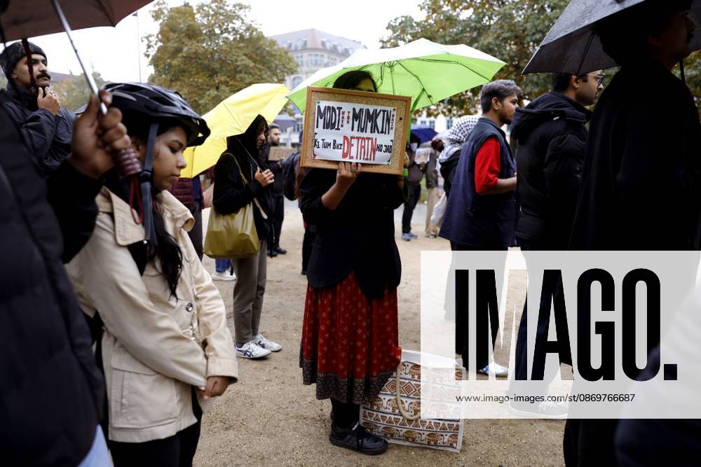 BERLIN, GERMANY - OCTOBER 17, 2026: A small group of demonstrators hold placards at Oranienplatz in the Kreuzberg district to show solidarity with mass protests in India and to protest against the crackdown on them, as several people take the floor to discuss the situation. The demonstration followed a call by Neha Bora, president of the All India StudentsÃ¢â‚¬â ¢ Association (AISA), for people everywhere to back the protests, saying Ã¢â‚¬oeeverywhere is Jantar MantarÃ¢â‚¬Â, the site in Delhi where the main protests are taking place. The protests demand the resignation of Chief Election Commissioner Gyanesh Kumar over a revision of electoral rolls that opponents say led to the mass deletion of voters, whi - ZUMAq101 20261017_zna_q101_074