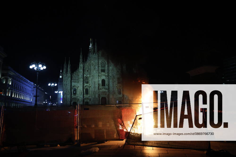 IPA89813376 - Milan, October 17, 2026: Italia in Piazza demonstration; violent clashes between police and the student movement; a construction site in Piazza Duomo set on fire