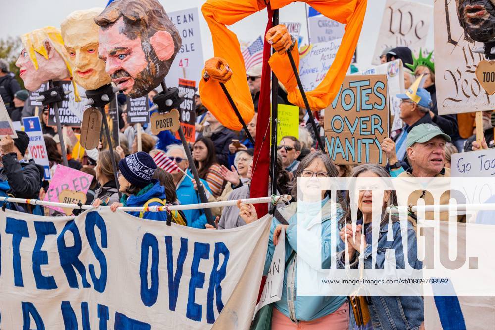 Protestors demonstrate in Washington D.C. as part of the No Kings: vote early nation wide protest. This Protest comes as the midterm elections come that could see the republicans loose control in congress Washington USA - ZUMAw218 20261017_znp_w218_009