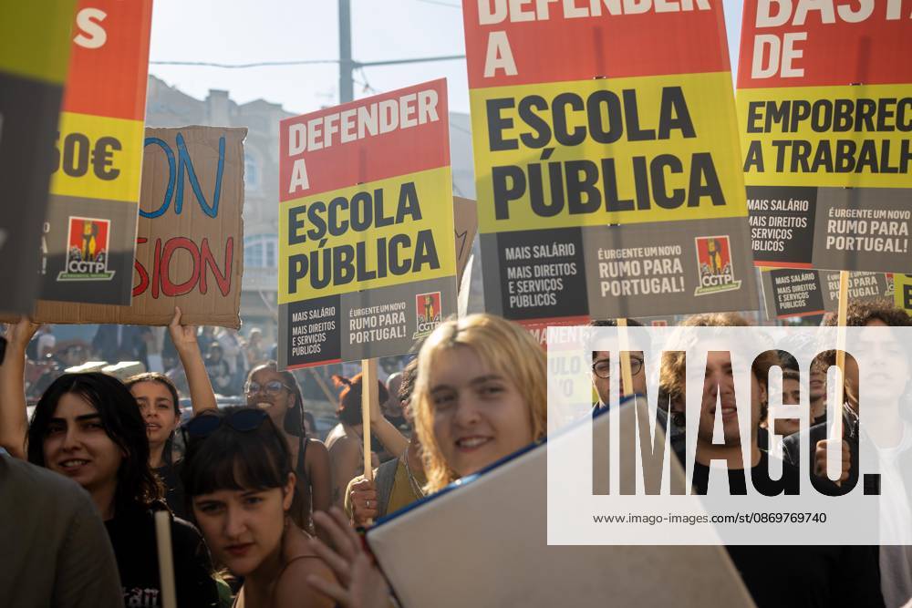 Protesters hold placards during the National CGTP demonstration. Thousands of people joined the National General Confederation of the Portuguese Workers National Inter-Union (Confederacao Geral dos Trabalhadores Portugueses Intersindical Nacional) (CGTP) demonstration in Porto, marching from Praca da Batalha to Praca de D. Joao I, where they converged with participants of a housing rights protest. Porto Portugal - ZUMAs197 20261017_aaa_s197_275