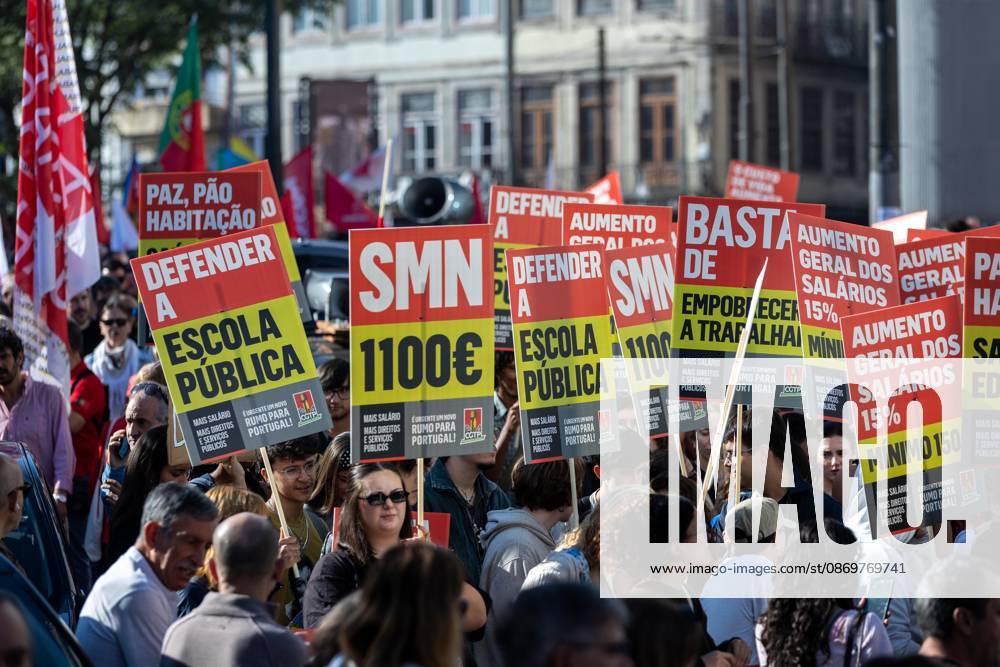 Protesters hold placards during the National CGTP demonstration. Thousands of people joined the National General Confederation of the Portuguese Workers National Inter-Union (Confederacao Geral dos Trabalhadores Portugueses Intersindical Nacional) (CGTP) demonstration in Porto, marching from Praca da Batalha to Praca de D. Joao I, where they converged with participants of a housing rights protest. Porto Portugal - ZUMAs197 20261017_aaa_s197_276
