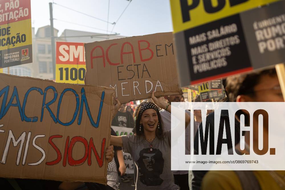 Protesters hold placards during the National CGTP demonstration. Thousands of people joined the National General Confederation of the Portuguese Workers National Inter-Union (Confederacao Geral dos Trabalhadores Portugueses Intersindical Nacional) (CGTP) demonstration in Porto, marching from Praca da Batalha to Praca de D. Joao I, where they converged with participants of a housing rights protest. Porto Portugal - ZUMAs197 20261017_aaa_s197_278