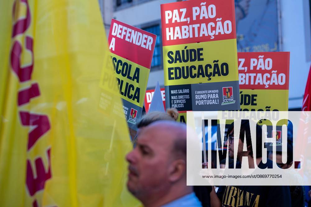 Protesters hold placards during the National CGTP demonstration. Thousands of people joined the National General Confederation of the Portuguese Workers – National Inter-Union (Confederação Geral dos Trabalhadores Portugueses – Intersindical Nacional) (CGTP) demonstration in Porto, marching from Praça da Batalha to Praça de D. João I, where they converged with participants of a housing rights protest. Porto Portugal - ZUMAs197 20261017_aaa_s197_271