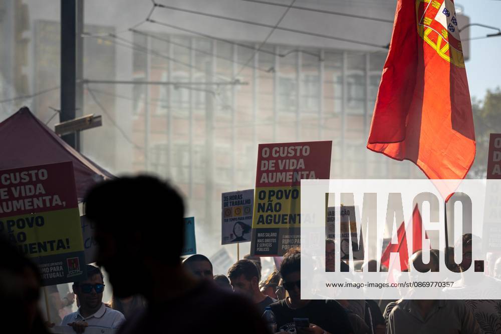 Protesters hold placards during the National CGTP demonstration. Thousands of people joined the National General Confederation of the Portuguese Workers – National Inter-Union (Confederação Geral dos Trabalhadores Portugueses – Intersindical Nacional) (CGTP) demonstration in Porto, marching from Praça da Batalha to Praça de D. João I, where they converged with participants of a housing rights protest. Porto Portugal - ZUMAs197 20261017_aaa_s197_301